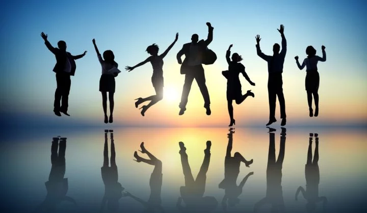 Image of seven consultants jumping on the Indefinite Leave to Remain (ILR) Visa page